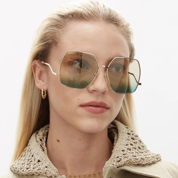 GUCCI GG1005S 001 sunglass gold /pink pearl frame with light brown to blue